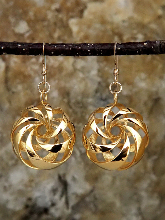 A pair of gold-plated brass cyclide earrings.